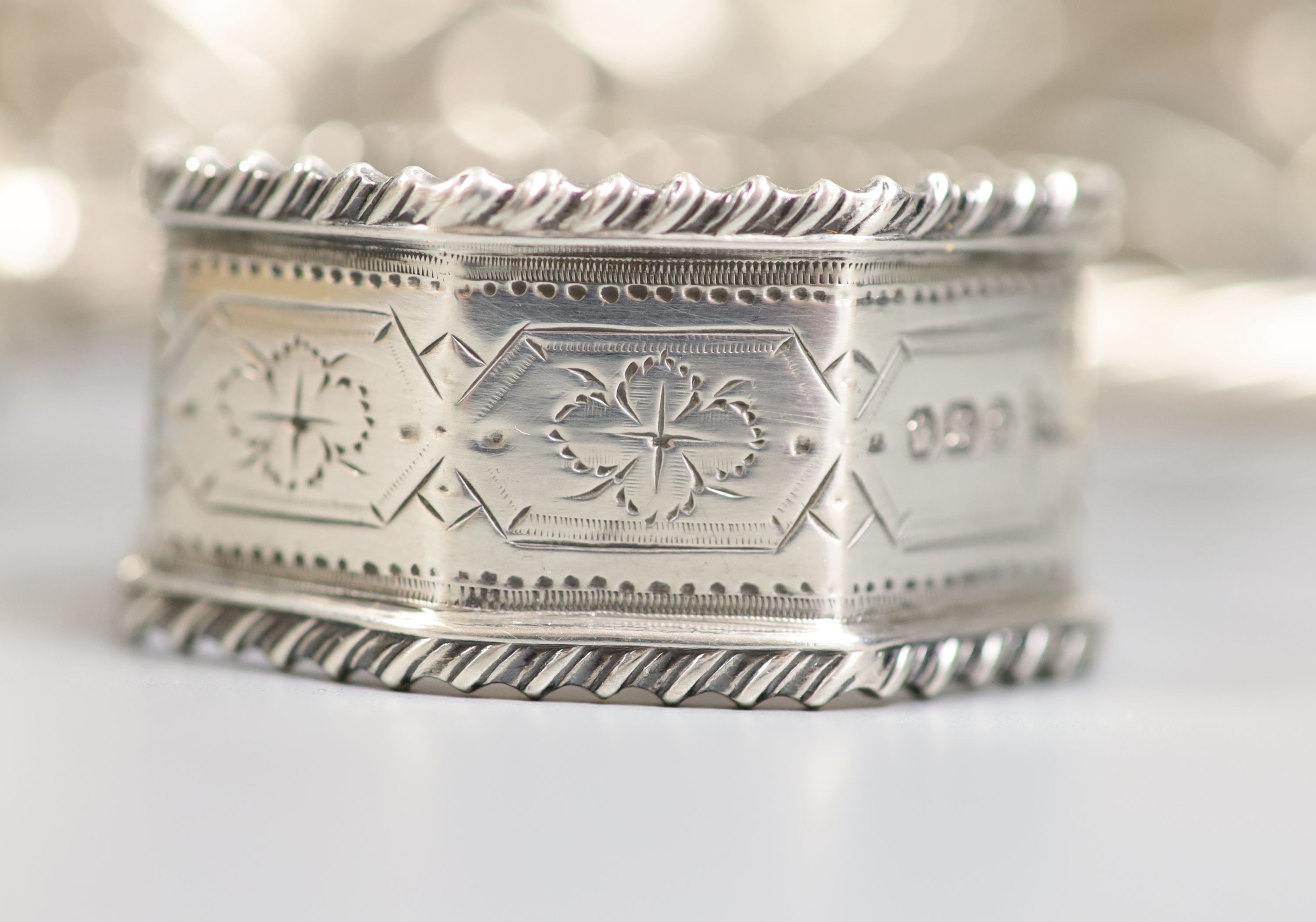 Four George V silver kiddush cups, largest 10.9cm, two other Judaic items, a 925 letter rack, silver napkin ring and Edwardian silver sugar basket.